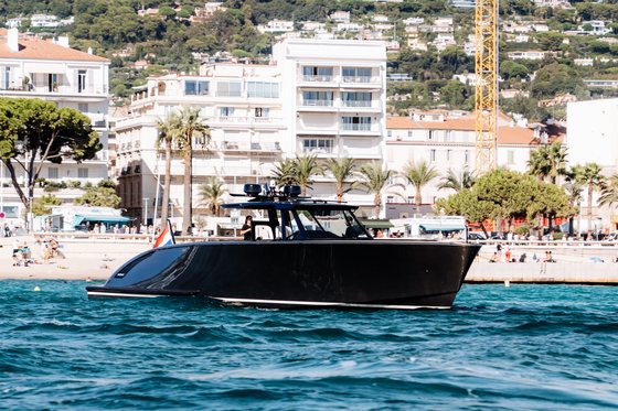 Black tender in front of the Croisette in Cannes